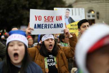 FILE PHOTO: People gather outside the U.S. Supreme Court during oral arguments in Trump administration’s bid to end the DACA program in Washington