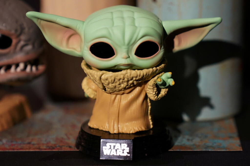 FILE PHOTO: A Baby Yoda toy is pictured during a “Star Wars” advance product showcase in the Manhattan borough of New York City