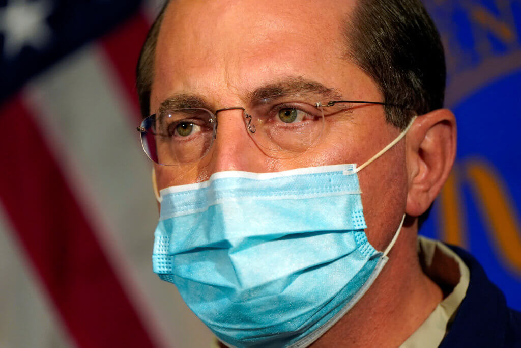 FILE PHOTO: Health and Human Services Secretary Alex Azar speaks before watching COVID-19 vaccines being administered to hospital workers at George Washington University Hospital in Washington