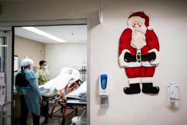 FILE PHOTO: A coronavirus disease (COVID-19) positive patient, at Trinitas Regional Medical Center in Elizabeth, New Jersey