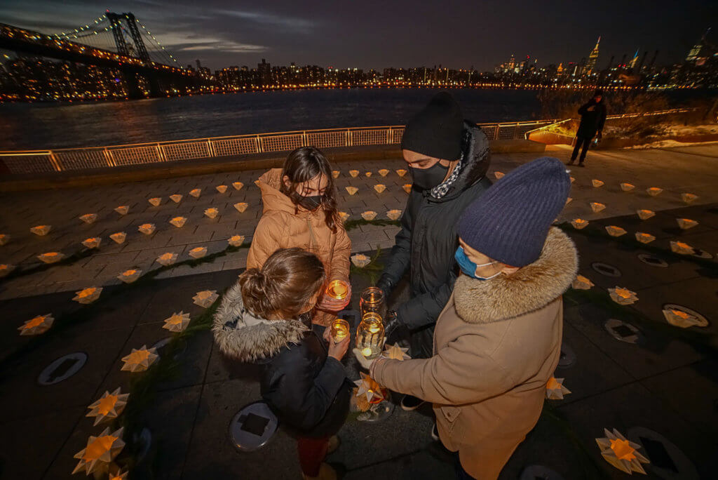 Families celebrate the first Winter Solstice Lantern Festival and labyrinth of light at Domino Park 3