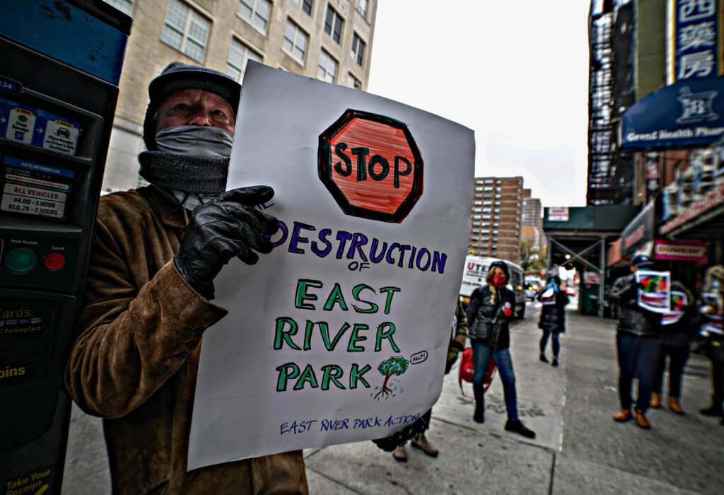 Lower East Side protesters say anti-pol poster not offensive, take aim at development issues 2