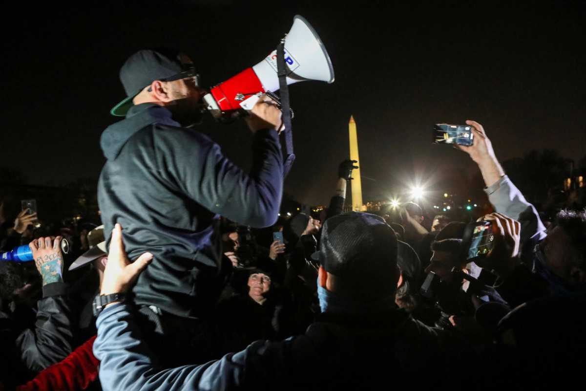 FILE PHOTO: Supporters of U.S. President Donald Trump and members of the far-right Proud Boys demonstrate, in Washington