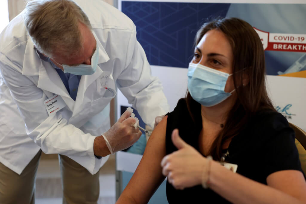 FILE PHOTO: Vaccination against the coronavirus disease (COVID-19) in Brooklyn