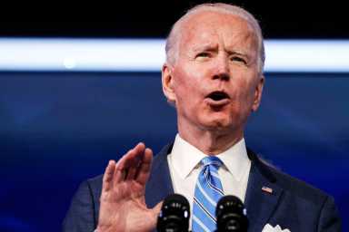 U.S. President-elect Joe Biden delivers remarks during a televised speech on the current economic and health crises at The Queen Theatre in Wilmington