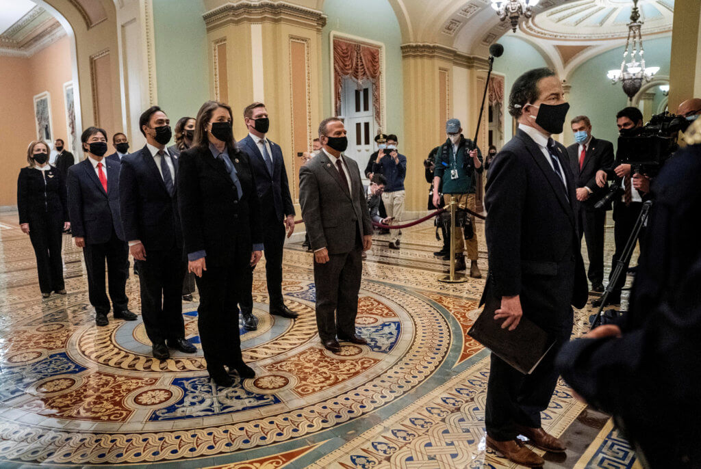 FILE PHOTO: Article of impeachment against former president Trump delivered to Senate