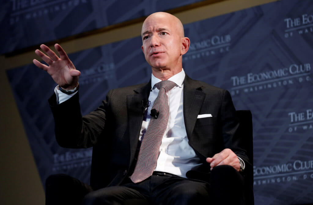 FILE PHOTO: Jeff Bezos, president and CEO of Amazon and owner of The Washington Post, speaks at the Economic Club of Washington DC’s “Milestone Celebration Dinner” in Washington