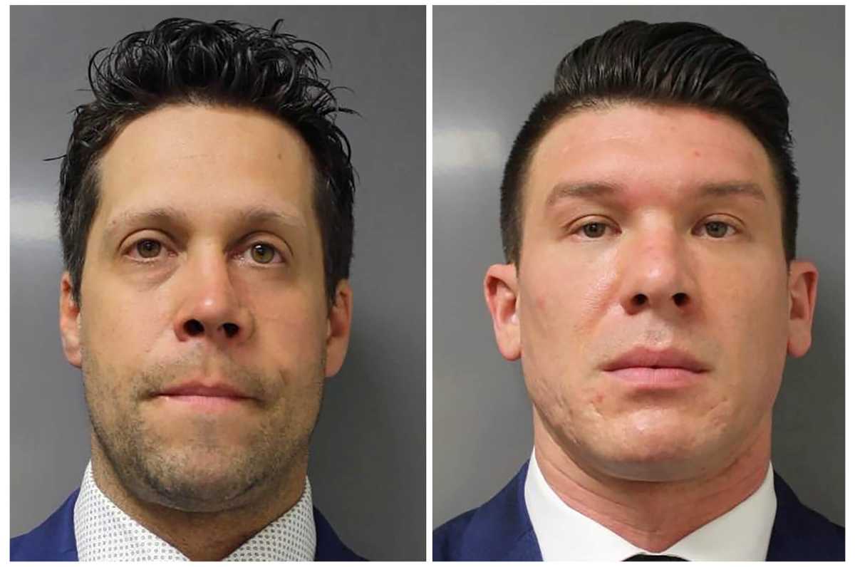 FILE PHOTO: Buffalo Police officers who were arraigned on felony assault charges pose in Buffalo