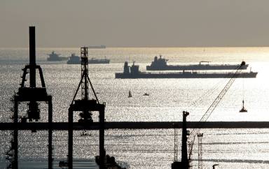 FILE PHOTO: Oil and gas tankers are anchored off the Marseille harbour