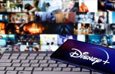 FILE PHOTO: Smartphone with displayed “Disney” logo is seen on the keyboard in this illustration
