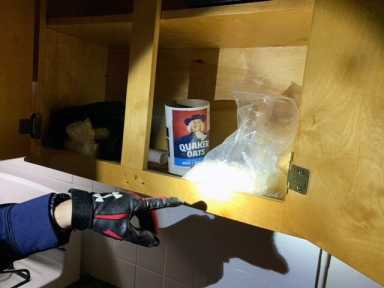 Crystal meth found in kitchen cabinet