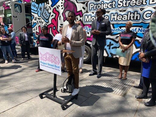 Public Advocate Jumaane Williams unveiling new NYC Keith Haring-Artwork Wrapped Mobile Health Center. Photo courtesy of Williams' office.
