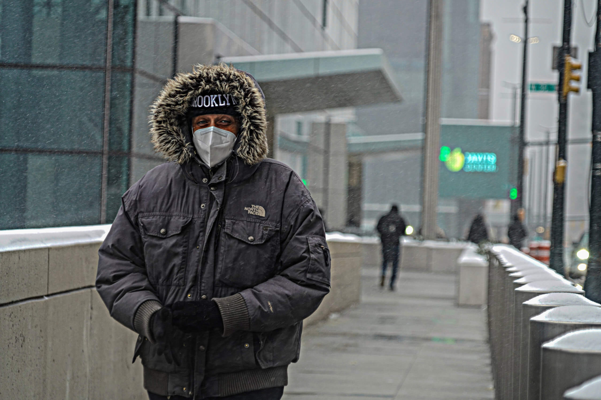 a man bundled against the cold in nyc