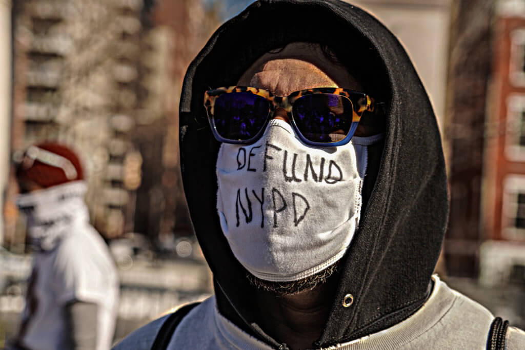 Running in protest: Activists race in Washington Square Park for racial justice and gun violence awareness during Black History Month 3
