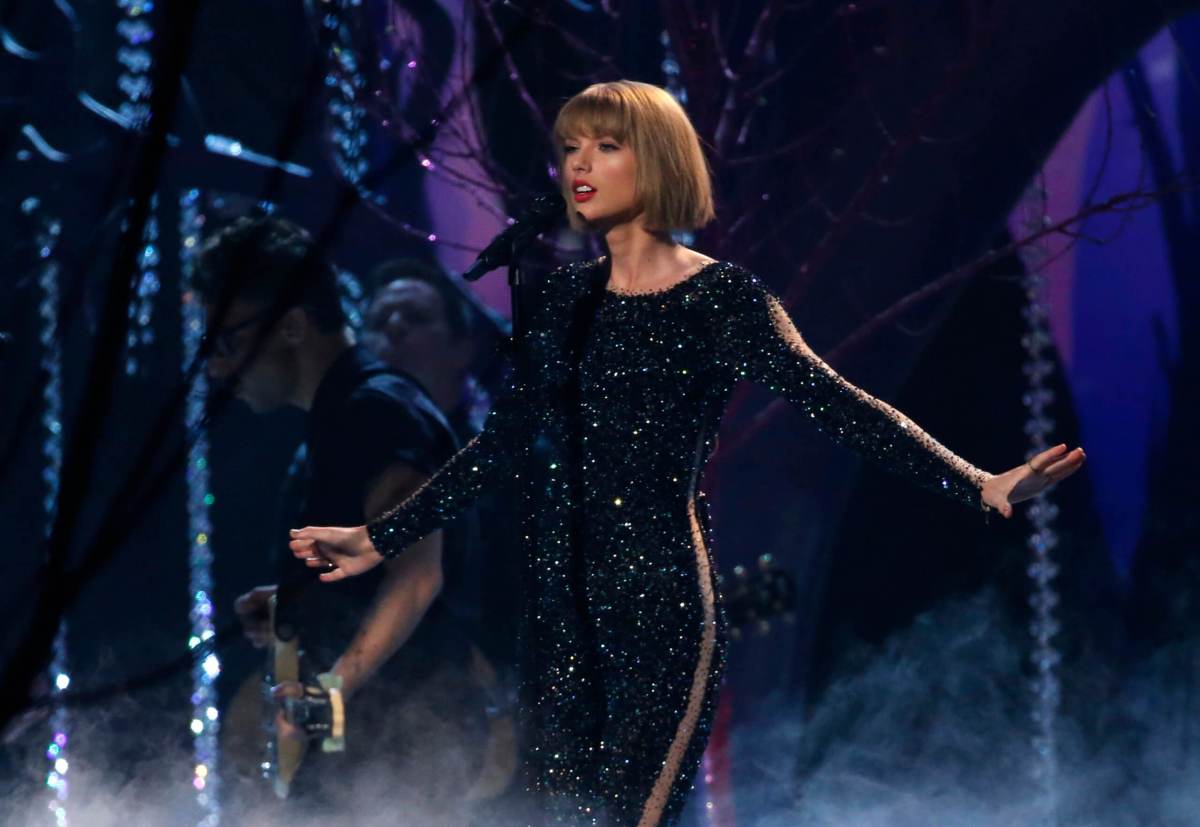 Taylor Swift performs “Out of the Woods” at the 58th Grammy Awards in Los Angeles