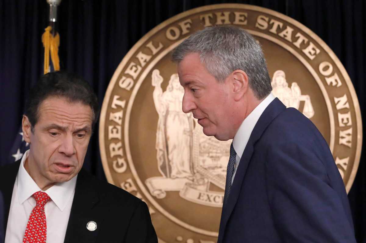 New York Governor Andrew Cuomo and New York City Mayor Bill de Blasio exit after delivering remarks at a news conference regarding the first confirmed case of coronavirus in New York State in Manhattan borough of New York City, New York