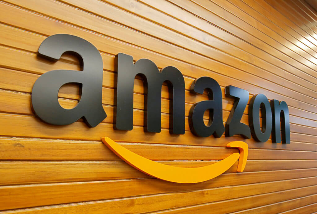 FILE PHOTO: The logo of Amazon is pictured inside the company’s office in Bengaluru