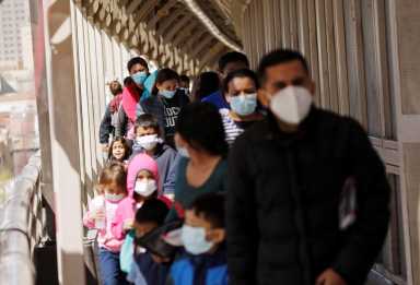Asylum-seeking migrants from Central America, who were airlifted from Brownsville to El Paso, Texas, and deported from the U.S., in Ciudad Juarez