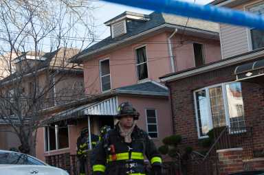 Firefighters rescued a woman during a house fire at 2444 83 Street.