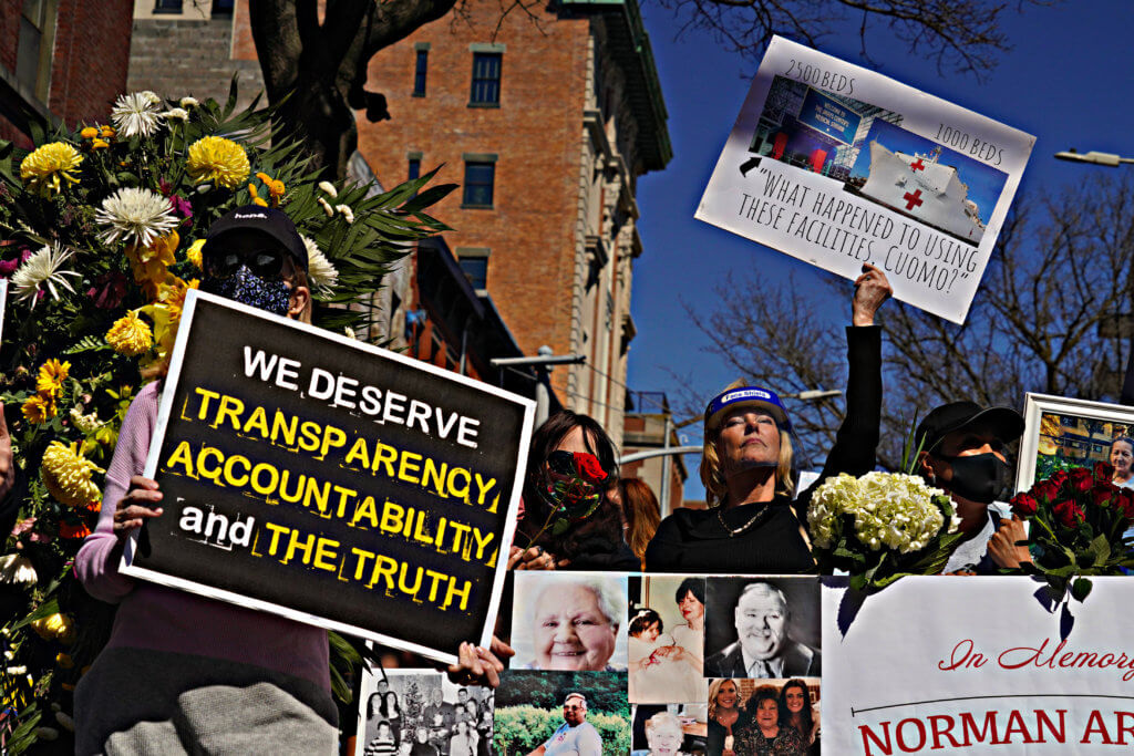 A wall of the lost: mourners erect memorial to COVID dead, demand Cuomo accountability 4