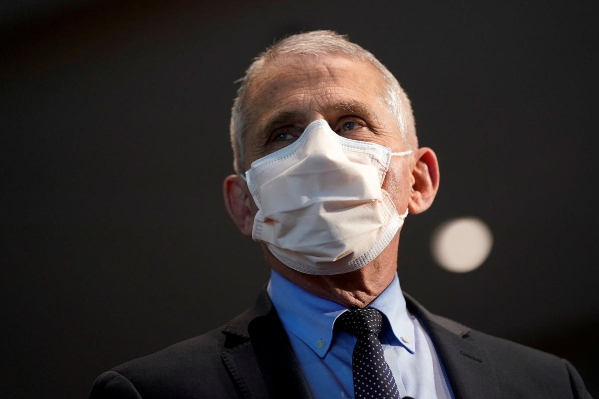 FILE PHOTO: Dr. Anthony Fauci, director of the National Institute of Allergy and Infectious Diseases, speaks at the National Institutes of Health, in Bethesda