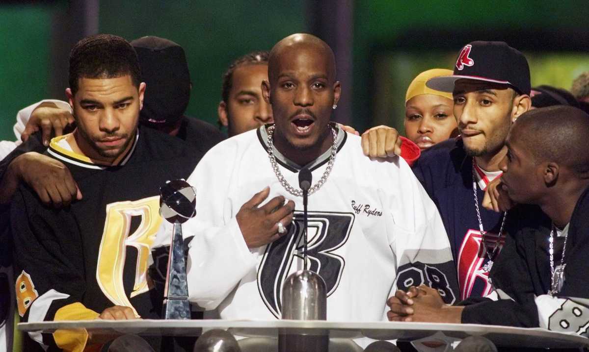 FILE PHOTO: Rapper DMX offers a prayer after winning the R&B Albums Artist of the Year award at the Billboar..
