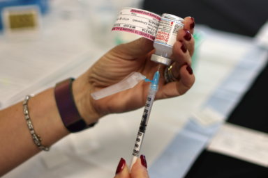 A nurse draws a Moderna coronavirus disease (COVID-19) vaccine, in Los Angeles