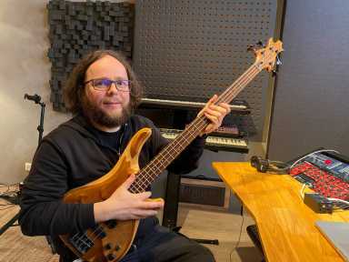 Elk founder Benincaso poses with a guitar in his office in Stockholm
