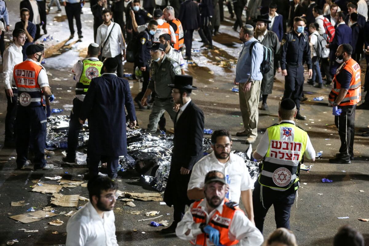 Medics and rescue workers attend to the Lag B’Omer event in Mount Meron, northern Israel, where fatalities were reported among the thousands of ultra-Orthodox Jews gathered