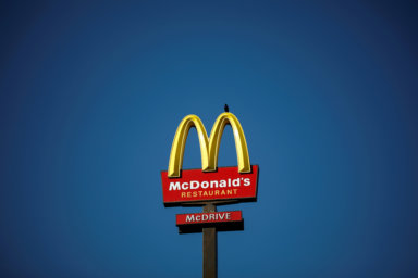 FILE PHOTO: The McDonald’s company logo stands on a sign outside a restaurant in Bretigny-sur-Orge, near Paris