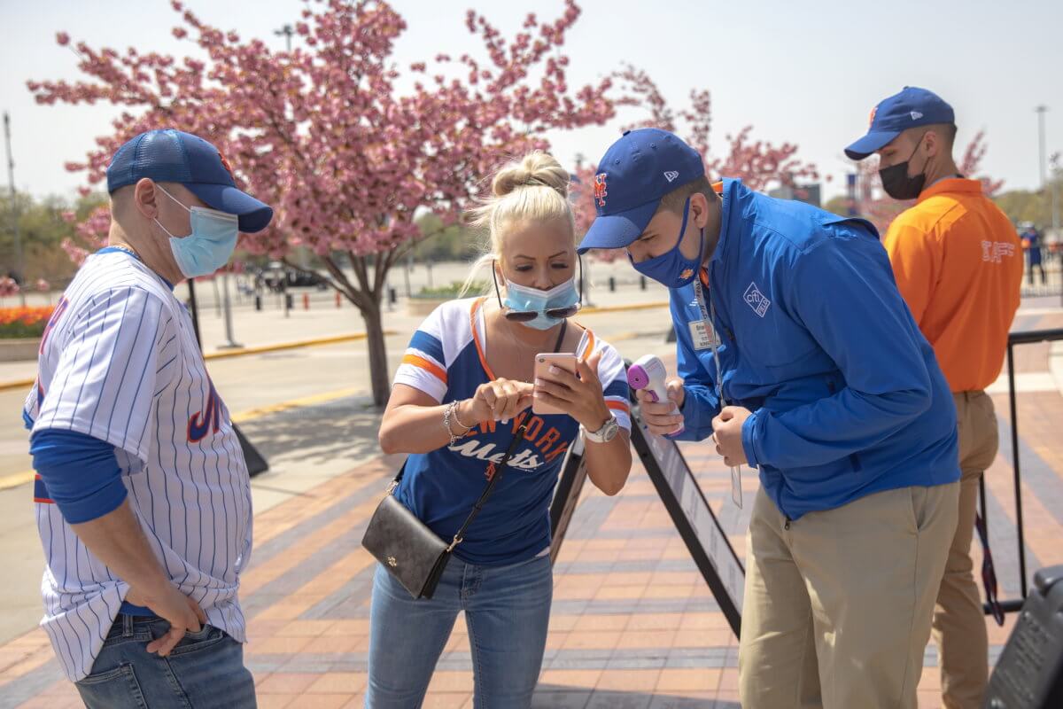 Fans arrive for a New York Mets game amid the coronavirus disease (COVID-19) pandemic, in Queens, New York