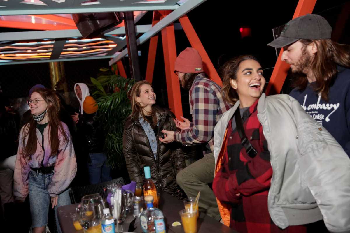 People interact at Elsewhere, a music venue and nightclub in Brooklyn, New York