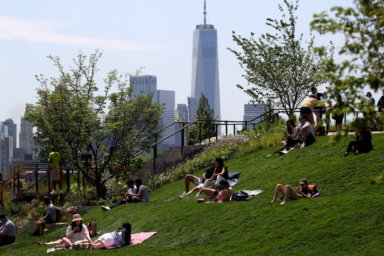 People visit Little Island Park, a new public park space which sits on stilts over the Hudson River during opening day in New York