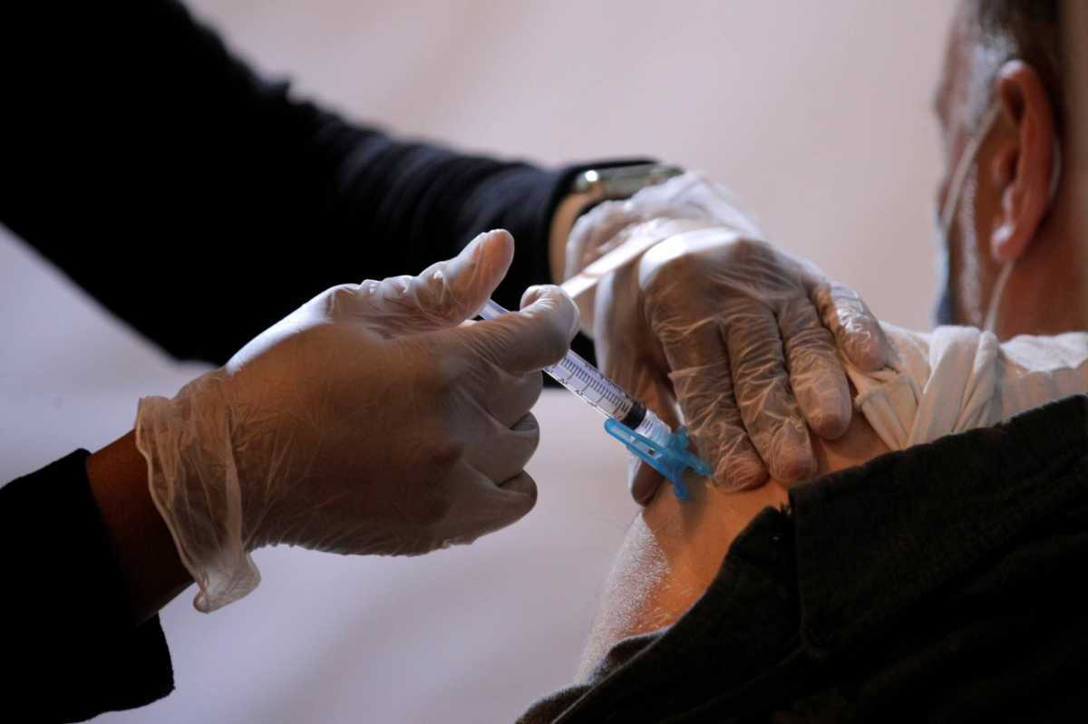 Commuter receives free vaccination for the coronavirus disease (COVID-19) at subway station in Brooklyn borough of New York City