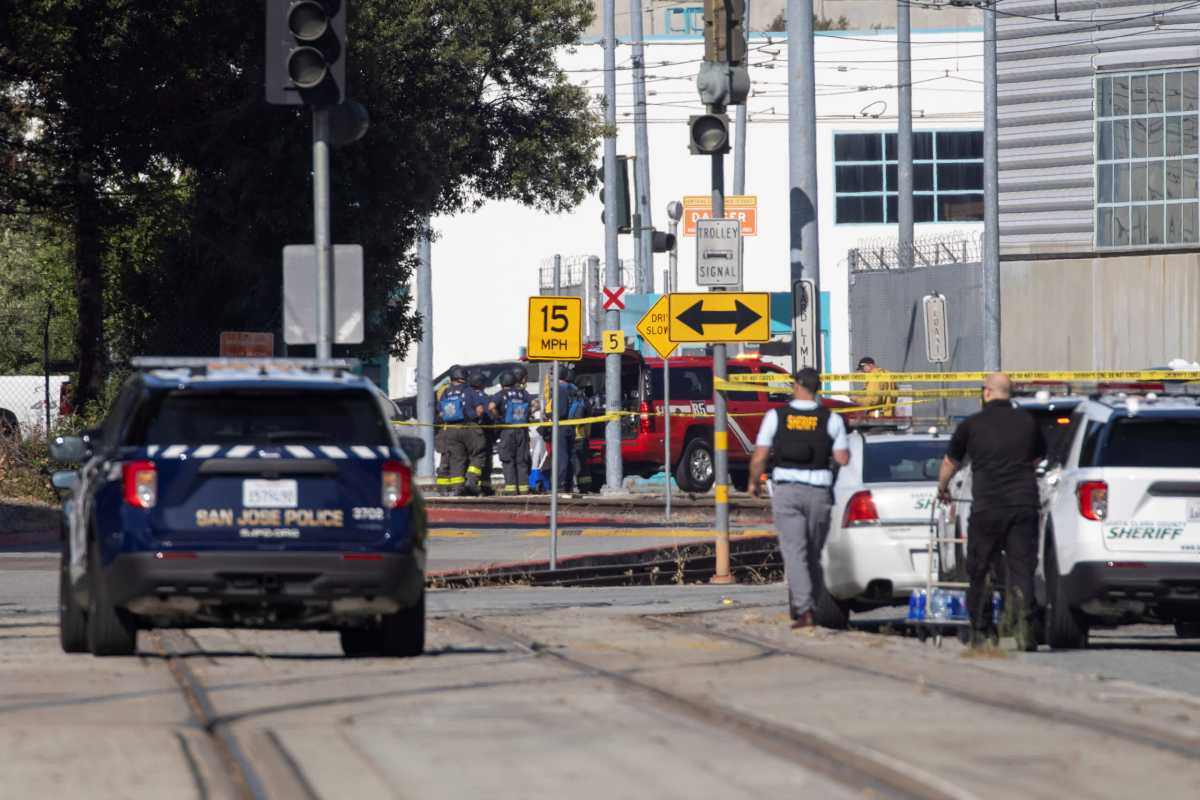 Police secure the scene of a mass shooting in San Jose