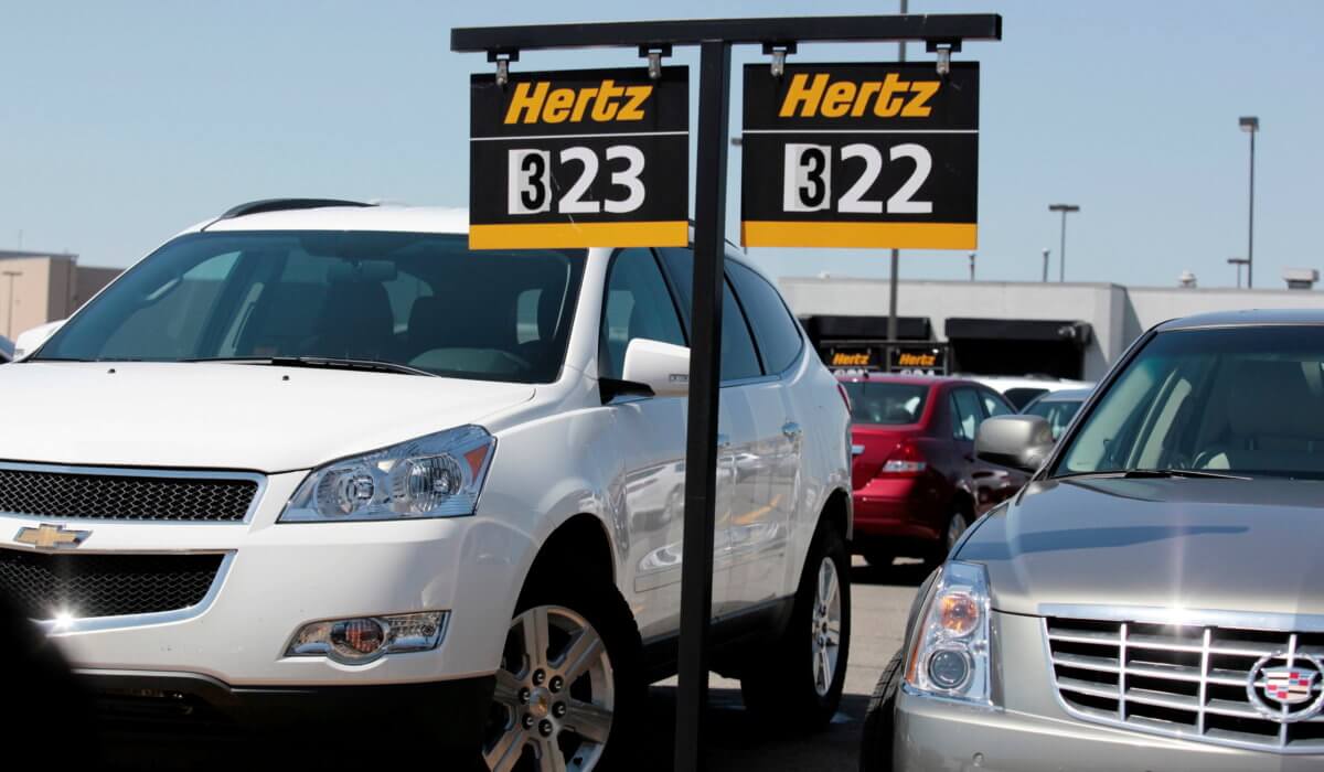 FILE PHOTO: FILE PHOTO: Hertz rental cars are parked in a rental lot near Detroit Metropolitan airport in Romulus