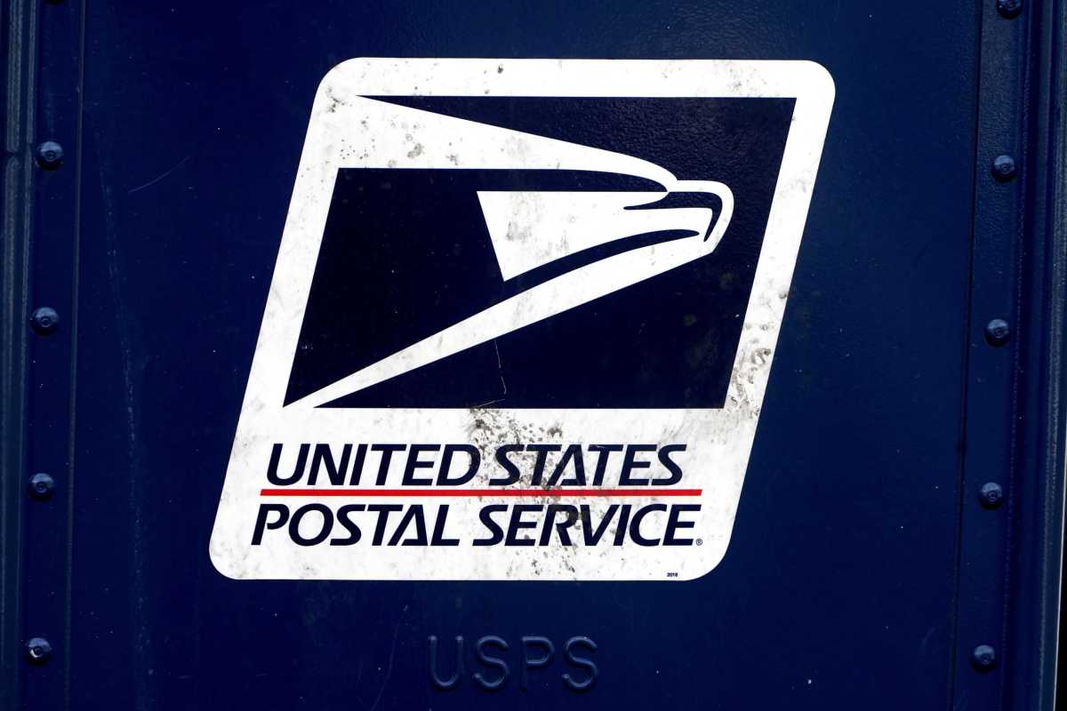FILE PHOTO: A U.S. Postal Service (USPS) logo is pictured on a mail box