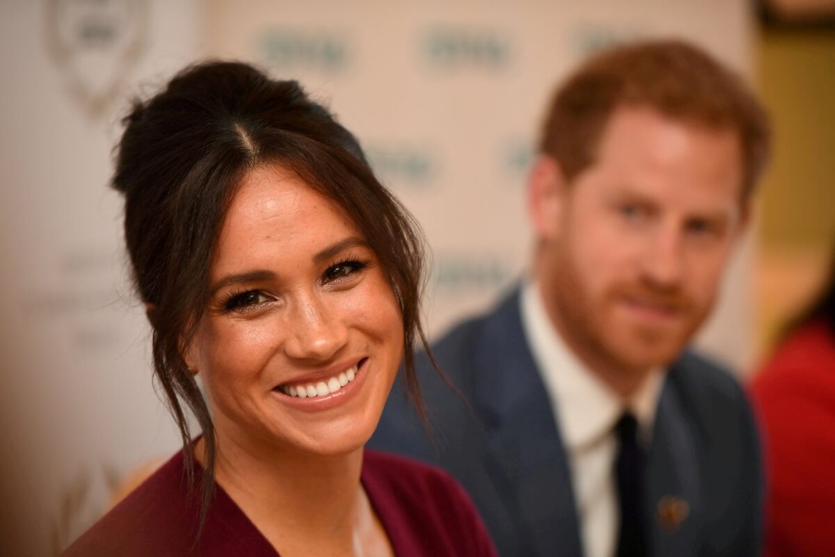 FILE PHOTO: Britain’s Meghan, the Duchess of Sussex, and Prince Harry, Duke of Sussex, attend a roundtable discussion on gender equality with The Queen’s Commonwealth Trust (QCT) and One Young World at Windsor Castle