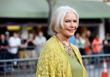 FILE PHOTO: Cast member Burstyn poses at the premiere of “Draft Day” in Los Angeles