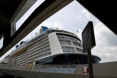 FILE PHOTO: Royal Caribbean’s Quantum of the Seas cruise ship docks at Marina Bay Cruise Center after a passenger tested positive for COVID-19 during a cruise to nowhere
