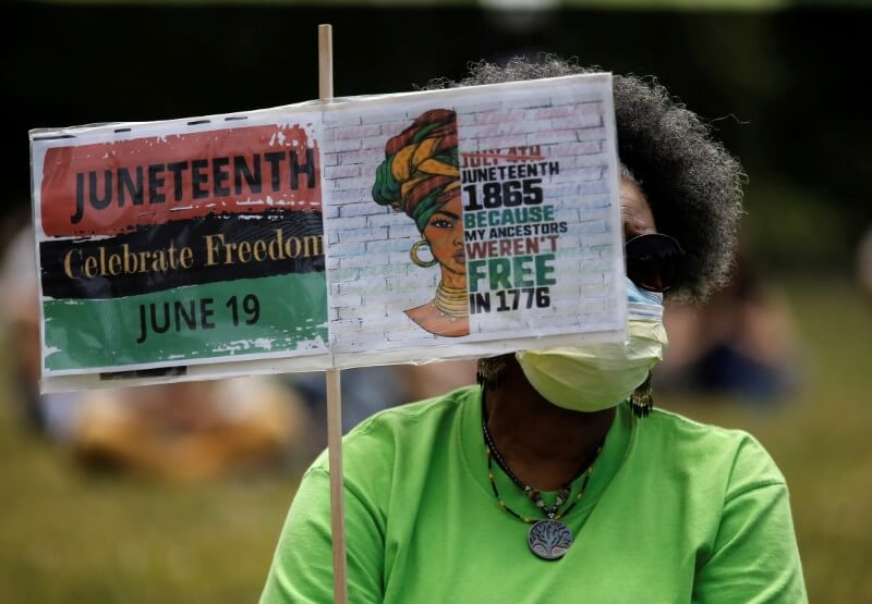 People gather at Judkins Park for Juneteenth, in Seattle