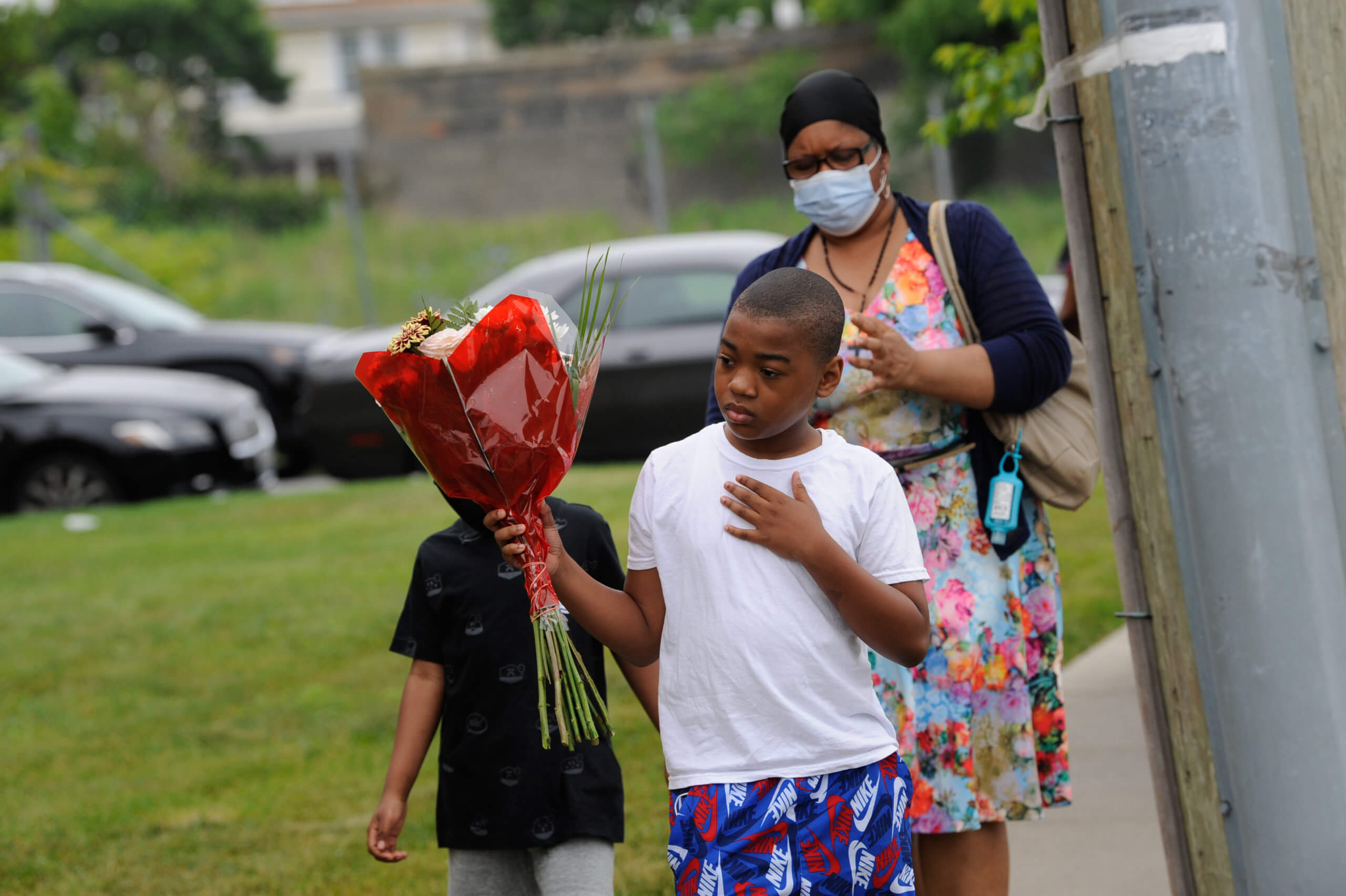 Agony in Queens as family says goodbye to 10-year-old shooting victim Justin Wallace 8