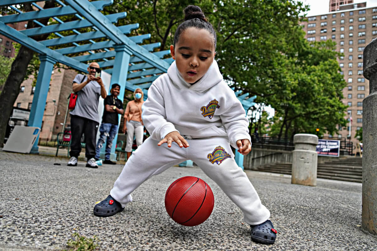 NYPD, community leaders unveil renovated Frederick Douglass Houses basketball  court