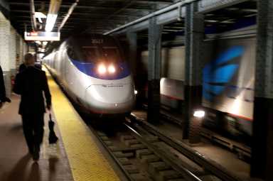 An Amtrak Acela train arrives at New York’s Penn Station, the nation’s busiest train hub, near a section of a complex of tracks that Amtrak says they will begin repairing over the summer in New York City