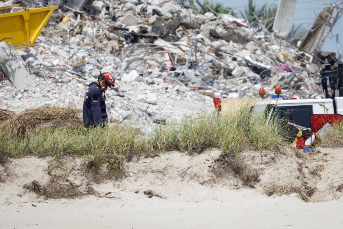 Search-and-rescue efforts resume the day after the managed demolition of the remaining part of Champlain Towers South complex in Surfside