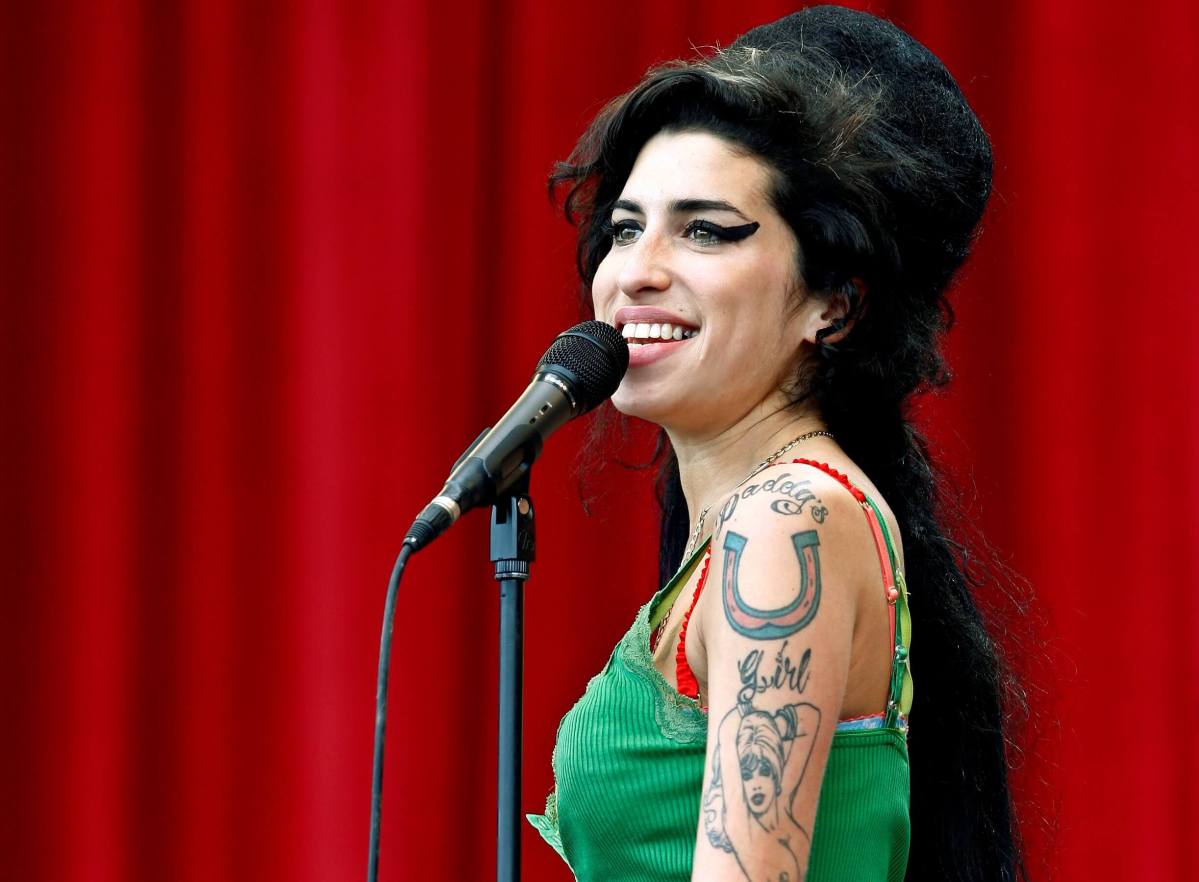 FILE PHOTO: British pop singer Winehouse performs during Glastonbury music festival
