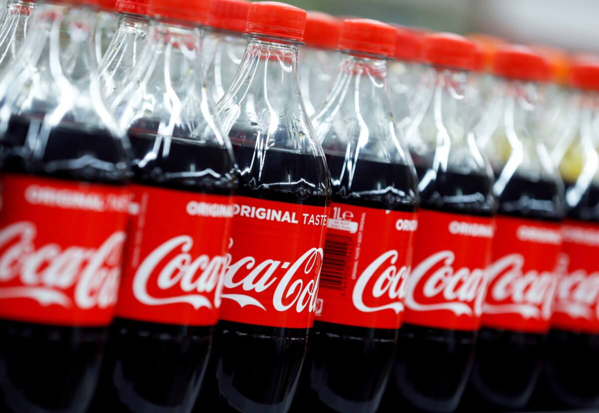 FILE PHOTO: Bottles of Coca-Cola are seen at a Carrefour Hypermarket store in Montreuil, near Paris