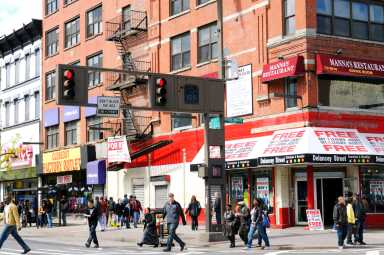 People Walking in Harlem, NYC.