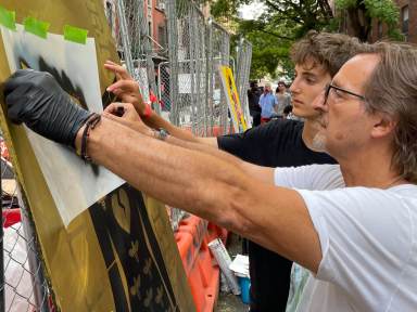 Brando assists dad Acool—Luca in the Be a Lover (street art) Fest.