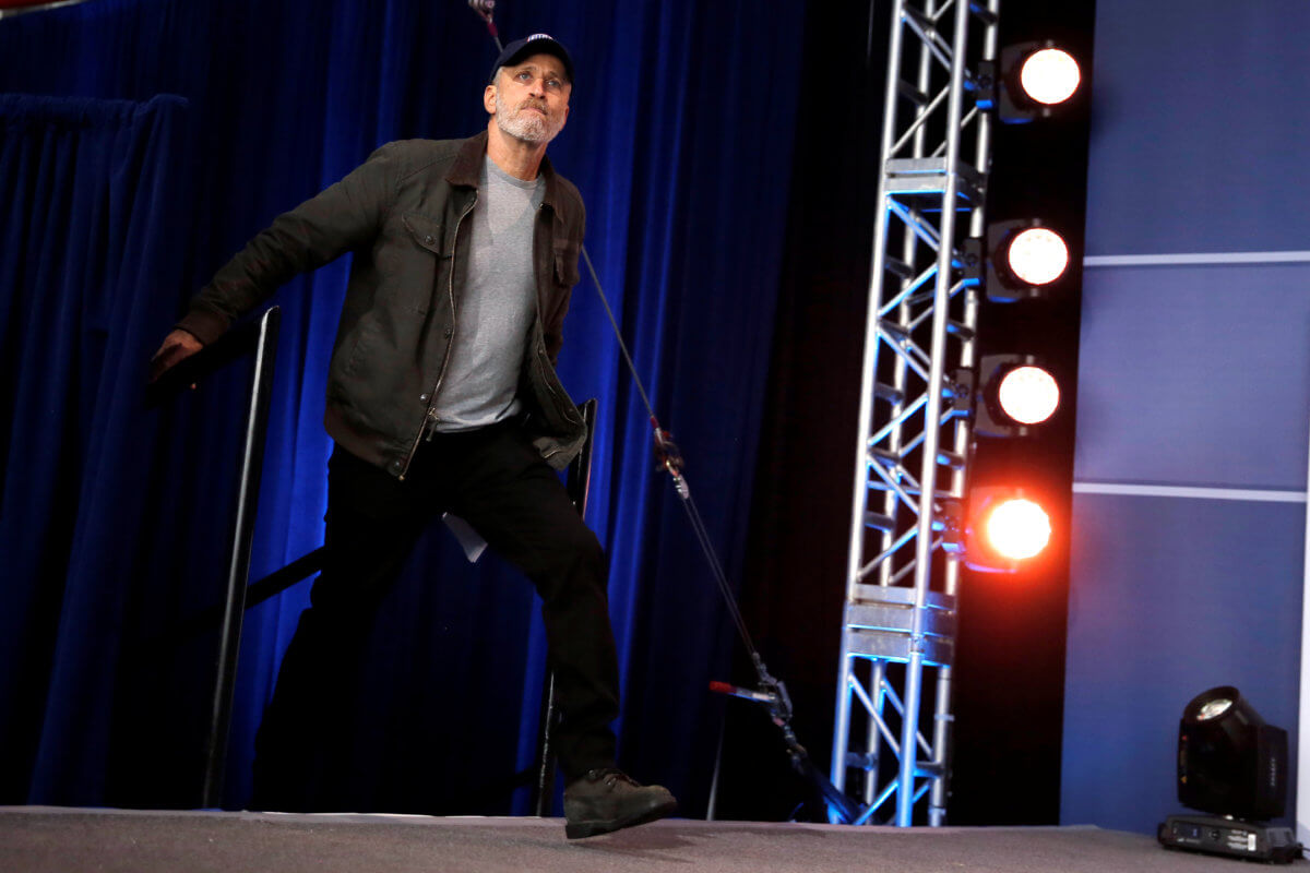 Comedian Jon Stewart attends a comedy show celebrating Military Appreciation Month as well as the 5th anniversary of Joining Forces and the 75th anniversary of the USO at Joint Base Andrews in Clinton, Maryland